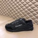 Dolce & Gabbana Black Lace Low Top Slip On Trainers Lateral Profile Dolce & Gabbana Black Lace Low Top Slip On Trainers lateral side view on leather surface