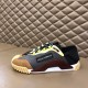 Dolce & Gabbana Grey Mesh Trainer Inner Side View in grey and yellow Medial side profile of the Dolce & Gabbana grey mesh trainer with yellow and burgundy details