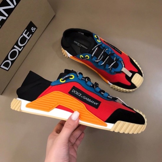 Dolce & Gabbana Red Mesh Trainers Top View Top-down view of red and blue Dolce & Gabbana slip-on trainers held in hand
