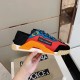 Dolce & Gabbana Red And Blue Colour-Block Low-Top Trainers Side View Dolce & Gabbana Red And Blue Colour-Block Low-Top Trainers lateral side profile