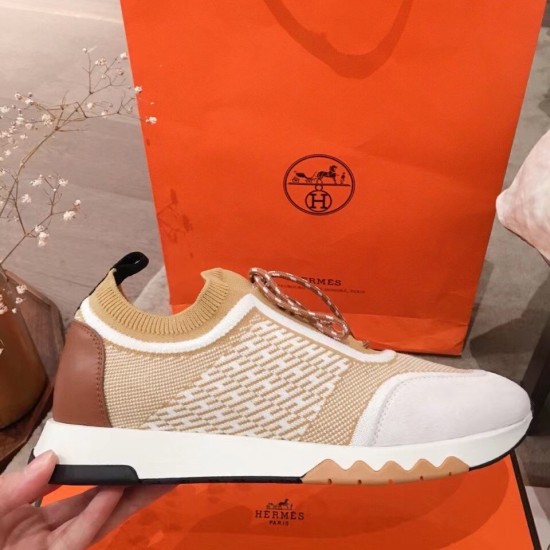 Hermes Addict Knit Trainers Beige White Side Profile Side profile view of single Hermes Addict Knit Trainer showing the beige upper and white midsole