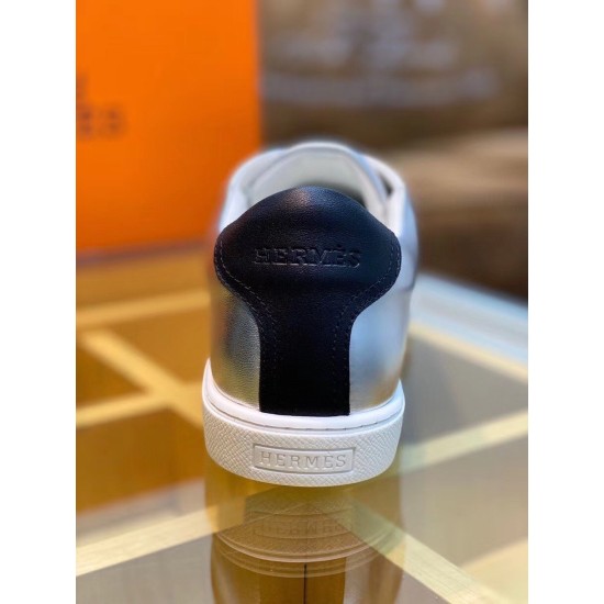 Hermes Avantage Metallic Silver Trainer Heel View Rear view of the metallic silver trainer highlighting the black leather heel tab and white midsole