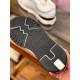 Hermes Addict White Leather Trainer Outsole Sole Detail Underside of the black rubber outsole on the Hermes Addict trainer showing tread pattern and brand embossing in white