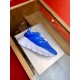 Versace Chain Reaction Blue Trainer Lateral View in blue and white Lateral side view of a blue Versace Chain Reaction trainer on display in blue and white