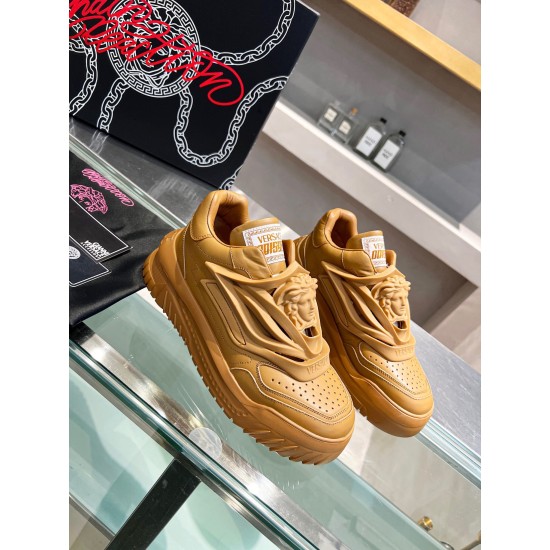 Three-quarter angled view of brown leather Versace Odissea trainers