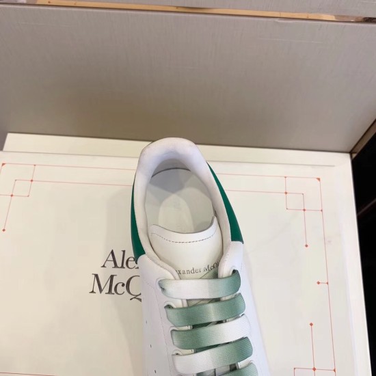 replica alexander mcqueenoversized sneakers with green heel uk