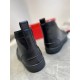 Christian Louboutin Men's Black Spiked High-Top Sneakers Heel Detail Rear view of Christian Louboutin Men's Black Leather Spiked High-Top Sneakers featuring smooth leather heel panels