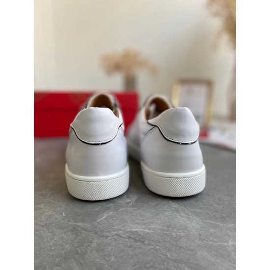 Rear heel view of Christian Louboutin Vieirissima white leather trainers highlighting heel tab and black piping