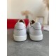 Rear heel view of Christian Louboutin Vieirissima white leather trainers highlighting heel tab and black piping