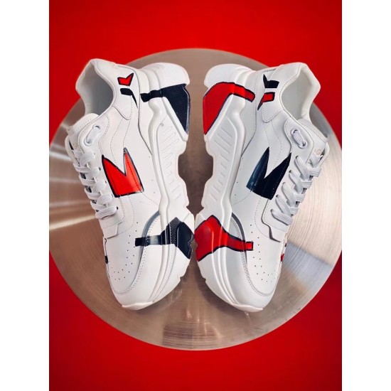 Dolce & Gabbana White Leather Trainers Side Profile Side profile of Dolce & Gabbana white leather trainers with red graphics