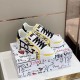 Dolce & Gabbana Portofino Printed White And Yellow Leather Trainers On Box Dolce & Gabbana Portofino Printed White And Yellow Leather Trainers resting on branded shoebox