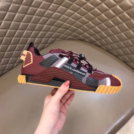 Dolce & Gabbana Bordeaux Red Fabric Trainer - Lateral Profile Side profile of a single Dolce & Gabbana bordeaux red fabric trainer with tan gum tread