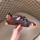 Dolce & Gabbana Bordeaux Red Fabric Trainer - Lateral Profile Side profile of a single Dolce & Gabbana bordeaux red fabric trainer with tan gum tread