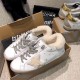 Golden Goose Super-Star White Trainers Boxed Pair in white and grey Pair of Golden Goose shearling lined white leather trainers resting in shoe box in white and grey