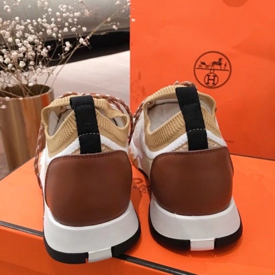 Hermes Addict Knit Trainers Brown Leather Heel View in beige and white Rear view highlighting the brown leather heel cups and black heel tabs of Hermes Addict Knit Trainers in beige and white