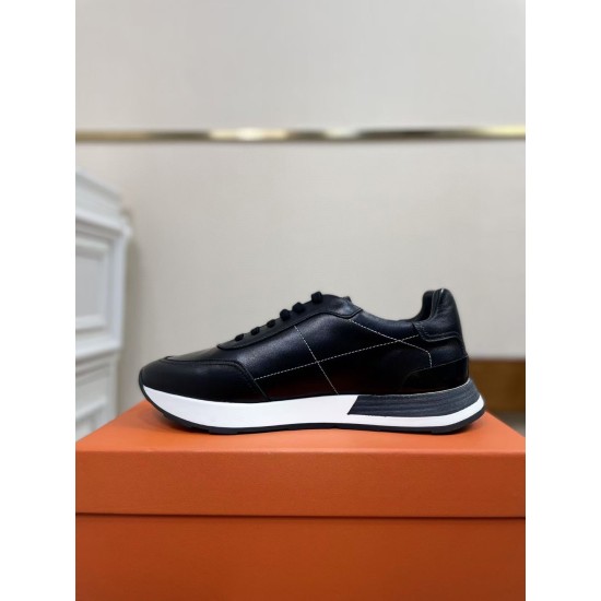 Hermes Drive Leather Low Top Trainers Black Medial Side in black and white Medial side profile of Hermes Drive Leather Low Top Trainer Black highlighting fine stitching detail in black and white