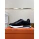 Hermes Drive Leather Low Top Trainers Black Medial Side in black and white Medial side profile of Hermes Drive Leather Low Top Trainer Black highlighting fine stitching detail in black and white