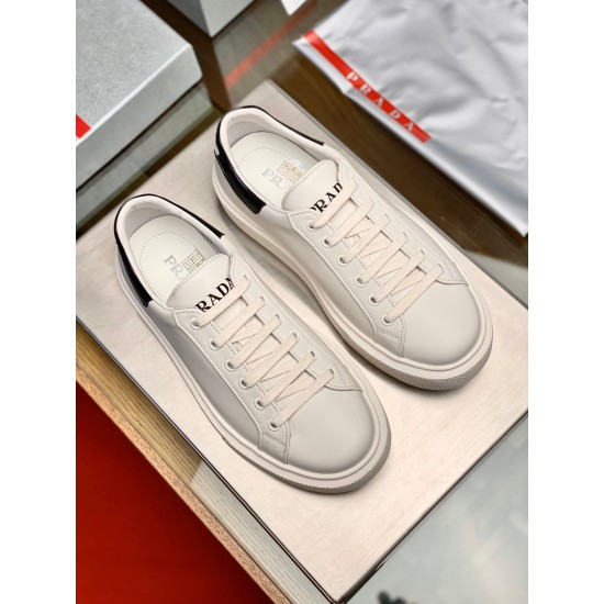 Top-down view of a pair of Prada Macro white and black leather trainers