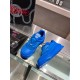 Versace Odissea Blue Leather Trainers Top View Top-down view of blue Versace Odissea trainers resting on a display counter