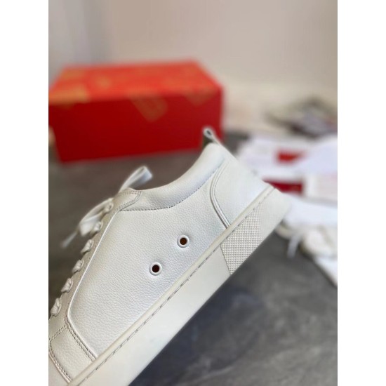 Christian Louboutin White Leather Trainer Detail View Close-up side view of Christian Louboutin white leather trainer highlighting stitching and ventilation holes