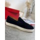 Lateral view of Christian Louboutin black suede Pik Boat Flat trainer highlighting white rubber midsole