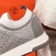 Close-up of the heel cap and ribbed collar on the Hermes grey knit trainer