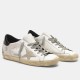 Golden Goose Super-Star White Leather Trainers - Front View in white and grey Pair of Golden Goose Super-Star white leather trainers with grey suede stars on a white background