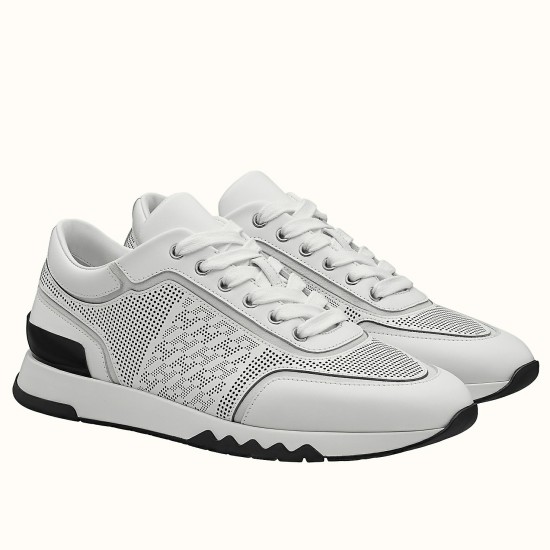 Hermes Addict White Perforated Leather Trainers Three-Quarter View Pair of white Hermes Addict perforated leather low top trainers shown at a three-quarter angle on a white background