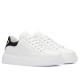 Side profile view of Prada Macro white leather low-top trainers with black heel accent