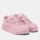 Front perspective view of Versace Odissea pink leather sculptural low top trainers showing Medusa motif detail