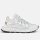 Versace Trigreca Low Top White Trainer Side View in white and gold Versace Trigreca Low Top White Trainer side view showing sculpted Greca midsole and gold branding