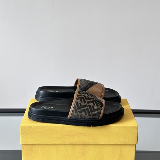 Fendi Diagonal Padded Slides In Brown - Box Display in brown and black Pair of Fendi brown and black slides resting on a yellow presentation box