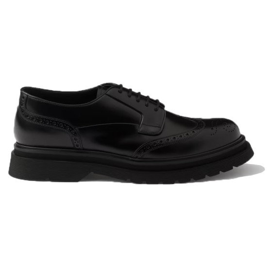 Side view of black Prada Men's Brushed Leather Derby Brogue Shoes Side profile of black Prada Men's Brushed Leather Derby Brogue Shoes showing the chunky sole