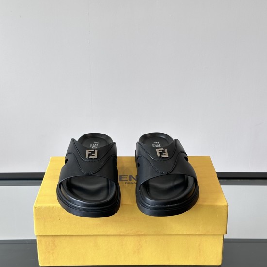Fendi Crisscross Leather Sandals In Black - Front View Frontal angle of black Fendi crisscross sandals highlighting metal hardware details