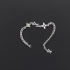 L Men's Monogram Row Silver Chain Bracelet laid flat on a dark surface