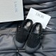 Dior Black Nubuck Calfskin Tokio Mules Top View Top down view of the black nubuck calfskin mules highlighting the rounded toes and interior footbed branding