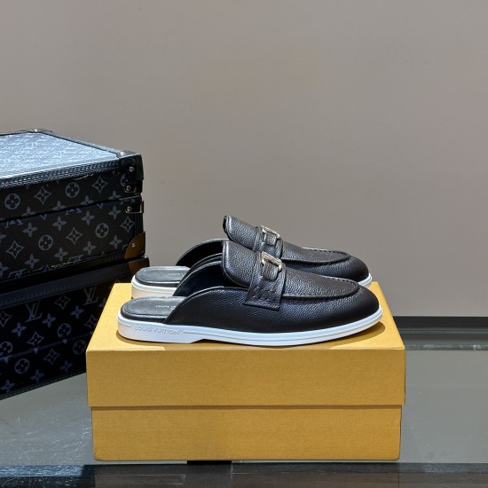Pair of L Men's Estate Open Back Leather Loafers in black resting on a shoe box in black and white