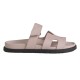 Hermes Chypre Sandals In Light Pink Side Profile Side profile view of Hermes Chypre Sandals In Light Pink showcasing the contoured footbed and dark rubber sole