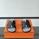 Hermes Izmir Black Leather Printed Sandals - Top View Hermes Izmir Black Leather Printed Sandals top-down view showing printed footbeds