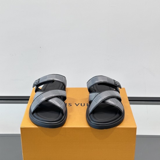 Frontal View of Black L Venice Mules Frontal view of black L Venice Mules displaying cross straps