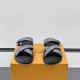 Frontal View of Black L Venice Mules Frontal view of black L Venice Mules displaying cross straps