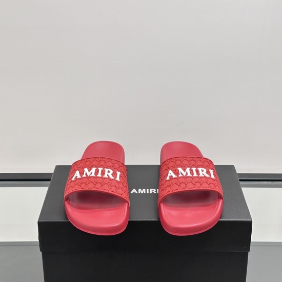 Front-facing view of the bright red slides highlighting the prominent white logo lettering