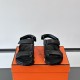 Hermes Black Sandals Front View in black and white Front upper view showing dual straps of the black sandals in black and white