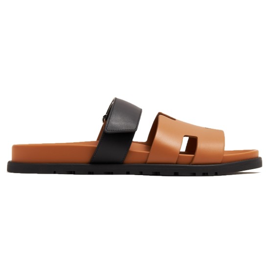Hermes Brown And Black Sandals Lateral Profile Hermes brown and black sandals side profile view showing adjustable strap and flat sole