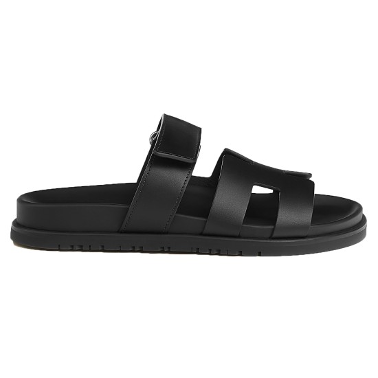 Hermes Chypre Black Leather Sandals Profile View Hermes Chypre black leather sandals shown from profile view
