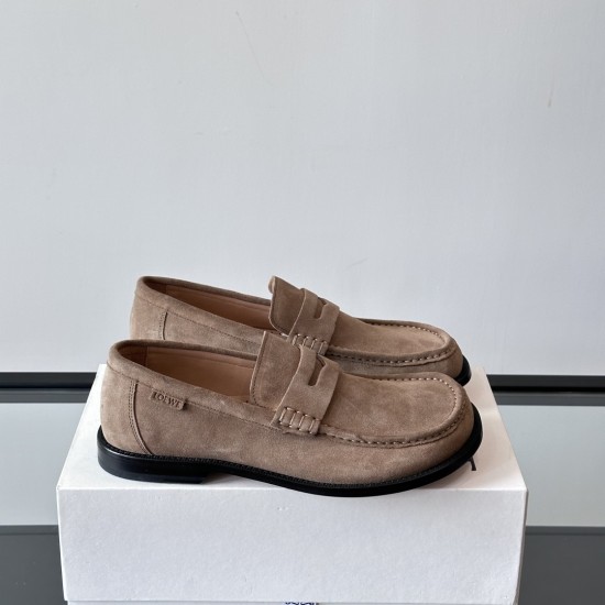 Loewe Men's Suede Penny Loafers In Tan Brown Side Profile Side profile view of Loewe Men's Suede Penny Loafers In Tan Brown placed on a white box
