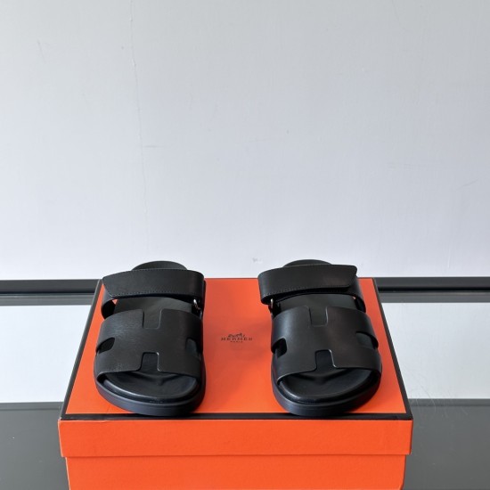Hermes Chypre Black Leather Sandals Front View Hermes Chypre black leather sandals presented from front angle