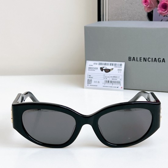 Balenciaga Women's Round Frame Sunglasses With Gold Logo Front View Balenciaga Women's Round Frame Sunglasses With Gold Logo straight front view highlighting dark tinted round lenses