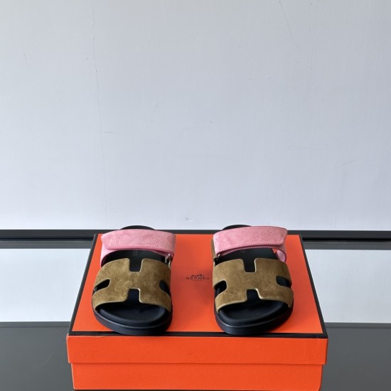 Hermes Chypre Suede Sandals Front View in pink and olive Front view of the Hermes Chypre suede sandals displaying the H-strap design in pink and olive