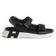 Hermes black leather junior sandals lateral profile showing white ridged sole